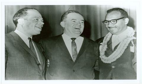 Senators Thomas Kuchel, and Hubert H. Humphrey with Mitchell celebrating passage of the 1964 Civil Rights Act.